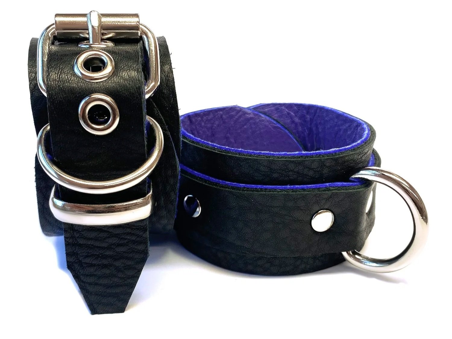 soft black leather bdsm cuffs lined in purple leather
