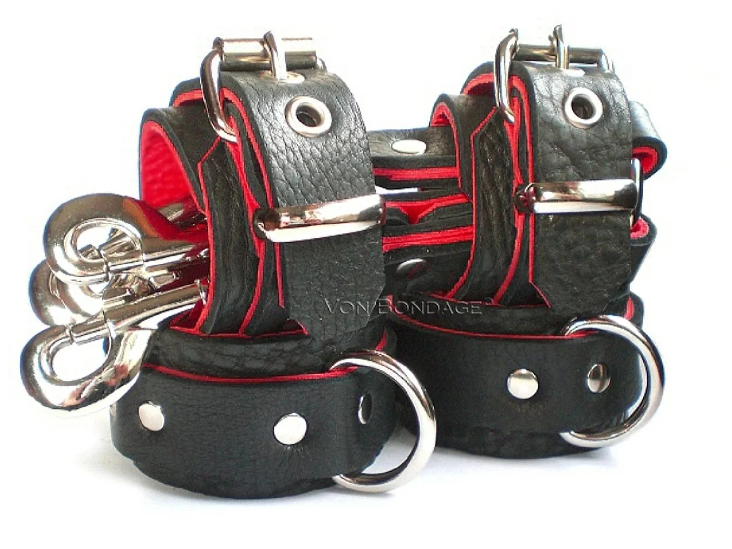 black leather bdsm restraints set lined in red leather with hogtie