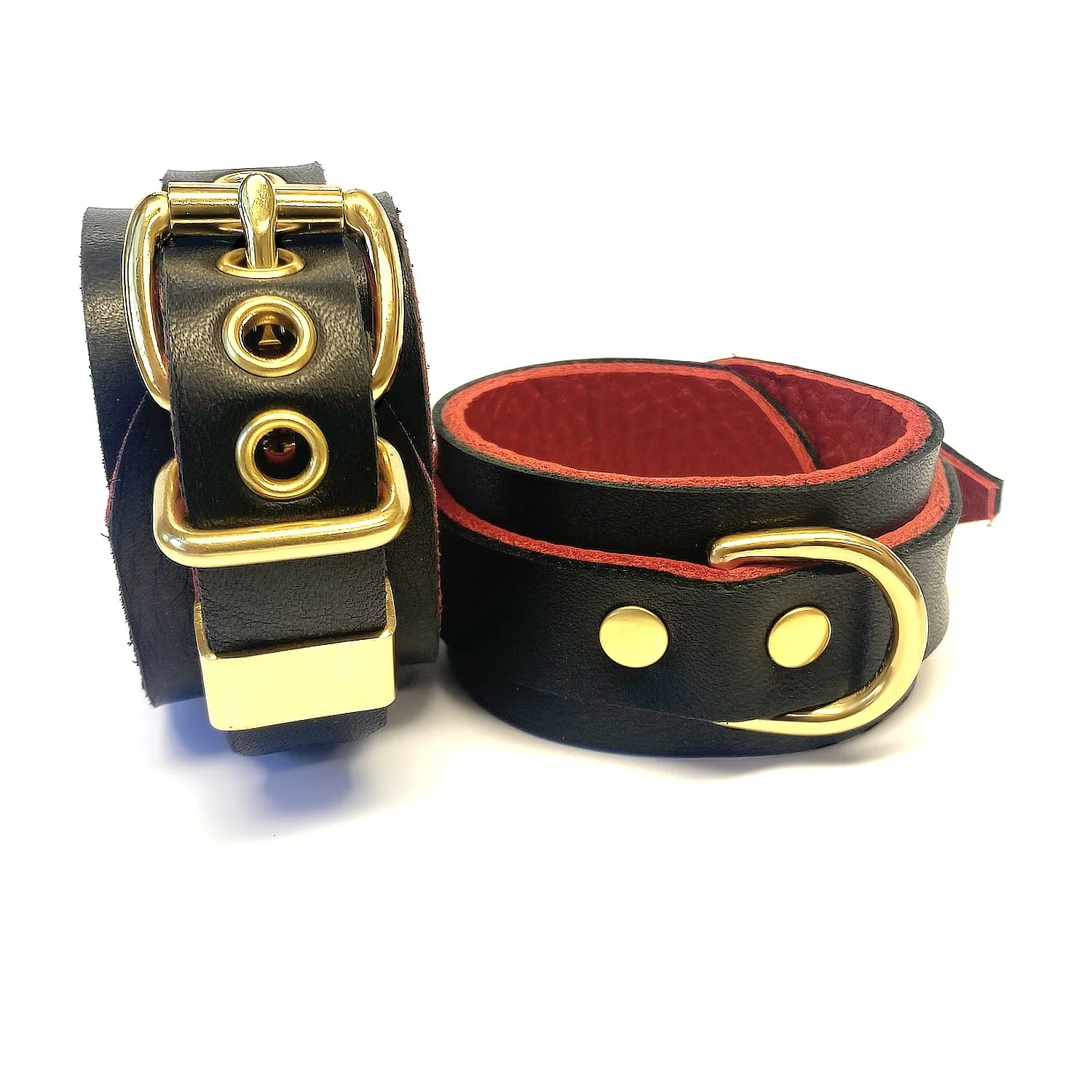 Pair of Soft Leather Restraints lined in Red Leather with Brass D-rings