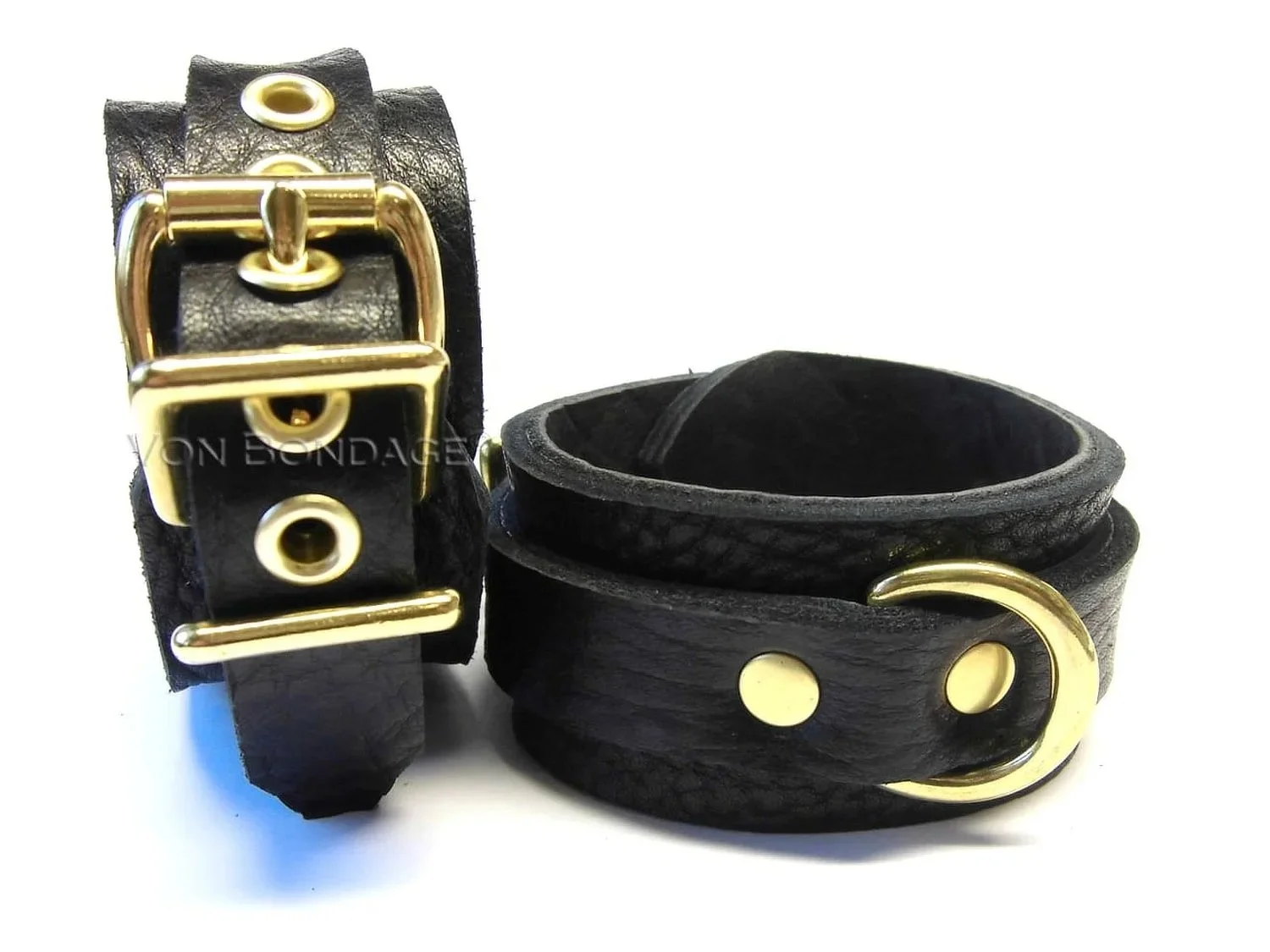 Black bullhide leather restraints with small brass dee rings
