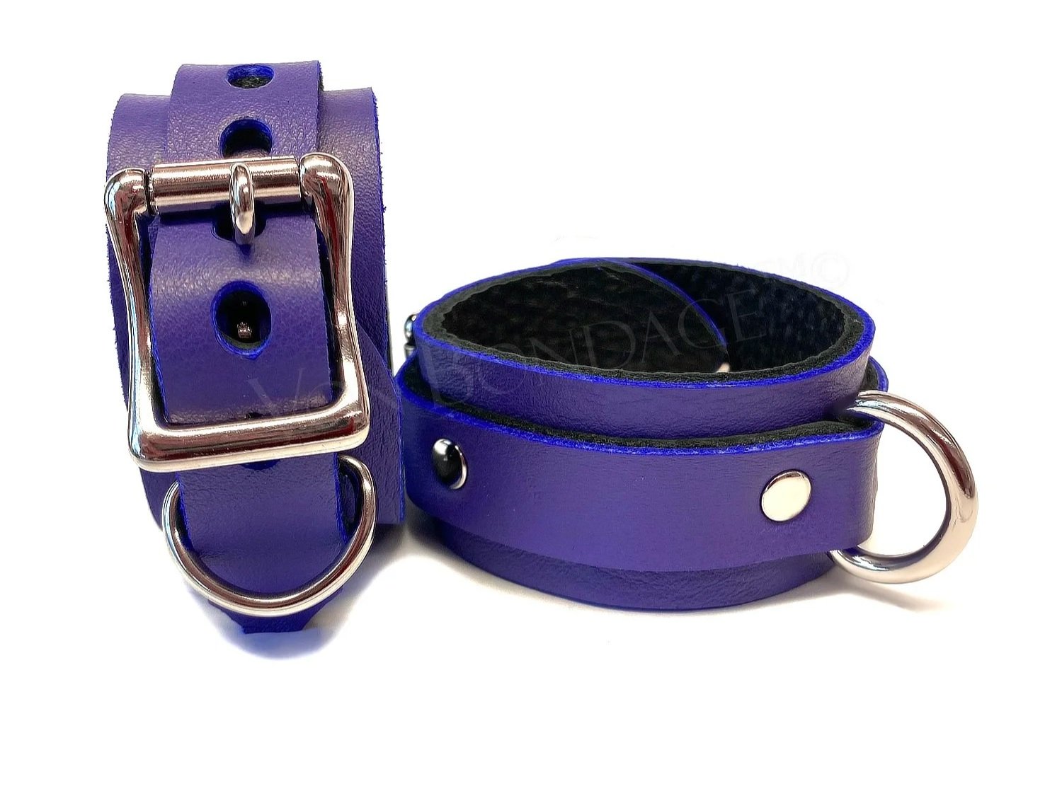 pair of purple leather bdsm restraints for wrists or ankles