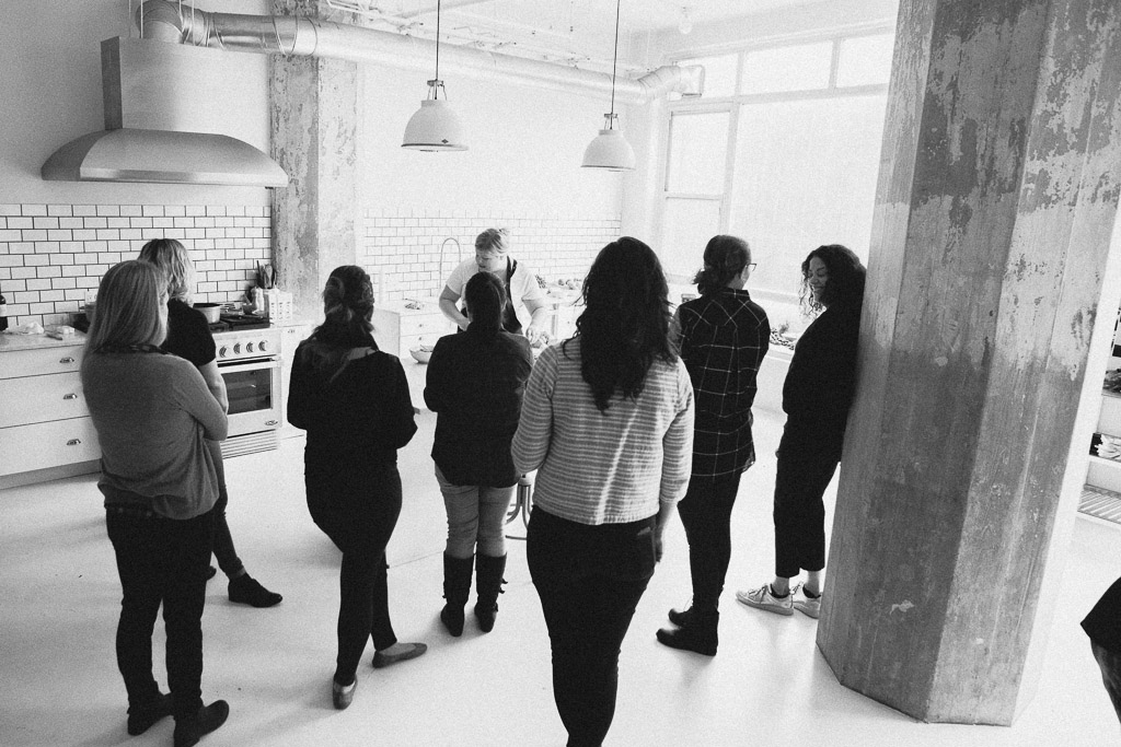 Attendees watching styling demo's
