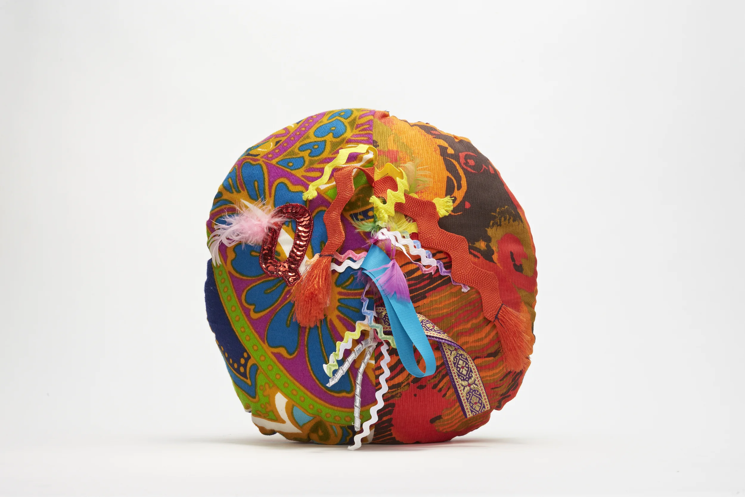 <div style="visibility: hidden">Apryl Miller colorful vintage fabric soft sculpture with trims, small</div>
