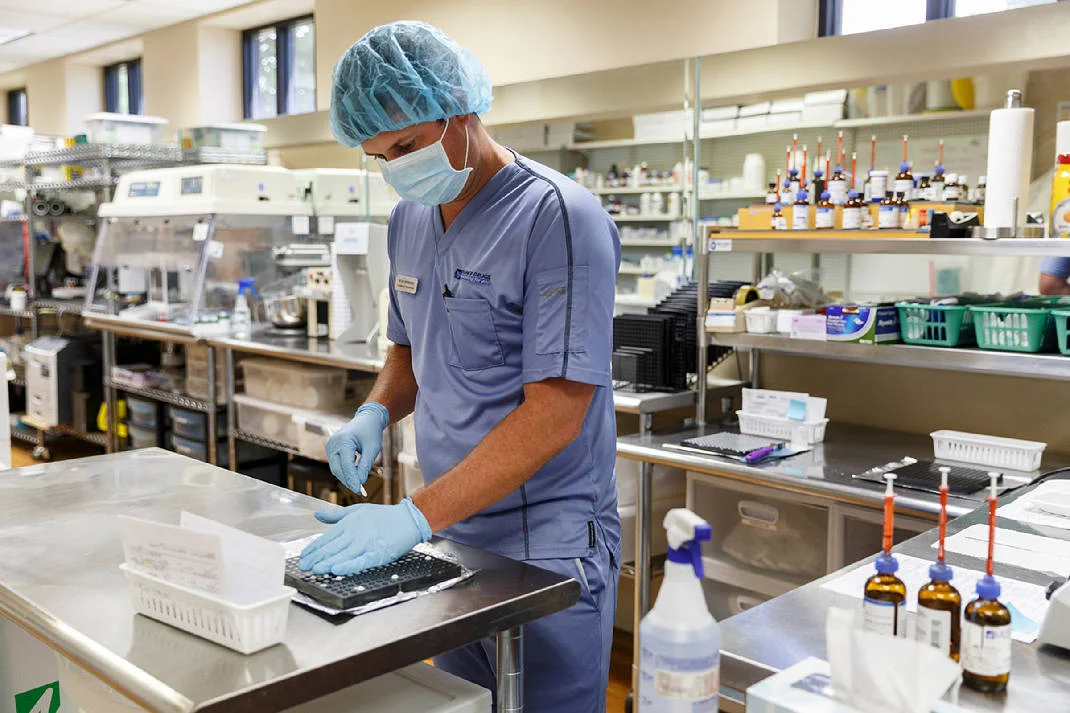Pharmacy technician Ryan Sherman makes troches, which are dissolvable hormone tabs, at Designer Drugs on Wednesday, Aug. 8, 2018, in Chattanoga, Tenn. The locally-owned compounding pharmacy specializes in eye drops with sales across all 50 states. Photo by Doug Strickland /Times Free Press.