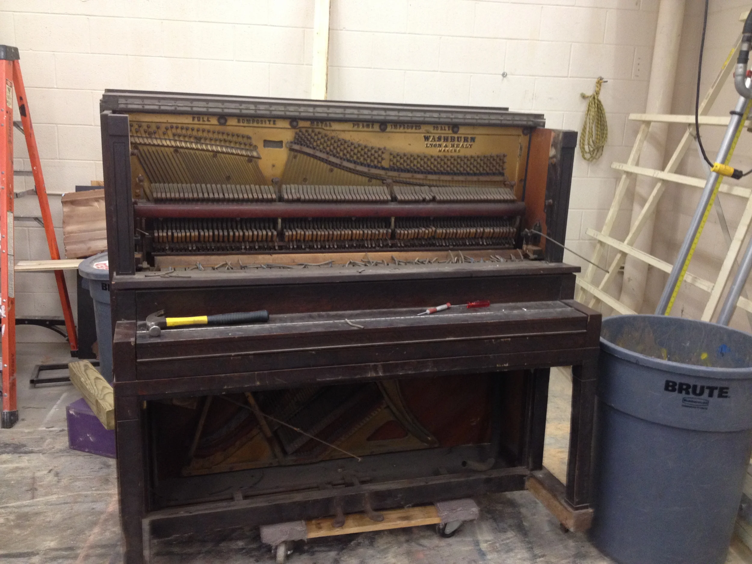  The bottom air pump system was removed and I had started on removing the piano hammers.   