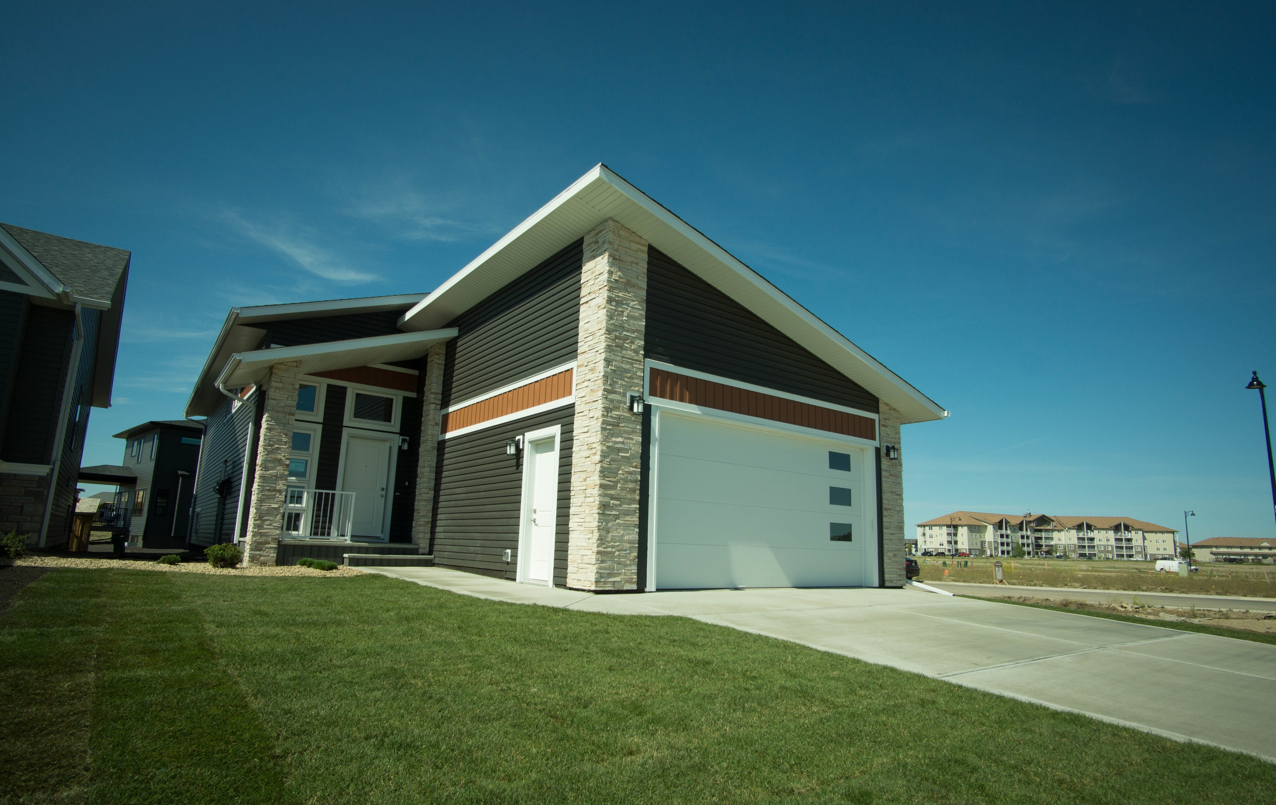 Street view 1 This is a 1260 sq ft bi-level that we designed and built for a customer. We think it turned out awesome. Talk to us about building one like it for you; because you want a mortgage helper downstairs or as an addition to your rental property portfolio.