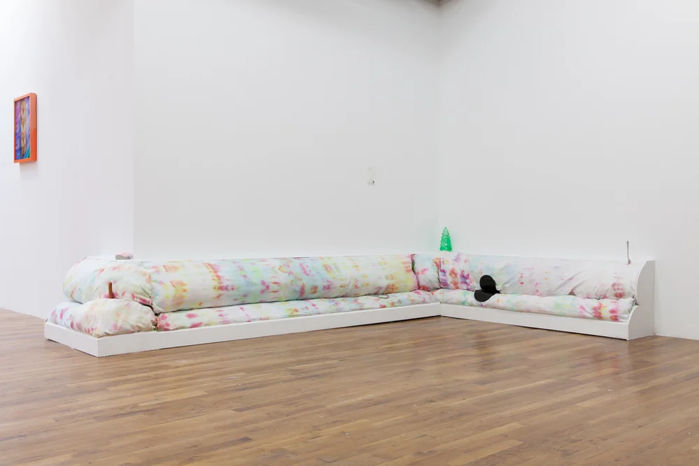 Carol Hu & Izabelle New 22 for 60 (couch for Still House) 2013 Wood, fabric, dye, artificial hot dog, diamond ring, fork from Still House, wasp in bag< leather Dimensions variable 
