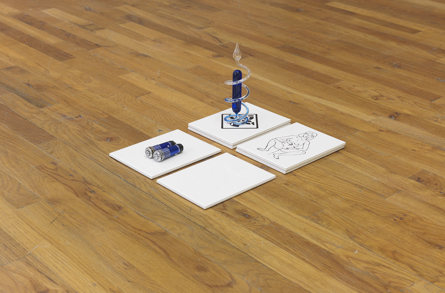 Carson Fisk-Vittori Open-air weather calibration (detail) , 2014 Ceramic tiles, inkjet transfers, negative-ion car air filters, metal commodity dispensers, zeolite rocks, styrofoam spheres, glass thermometer, glass barometer Dimensions variable
