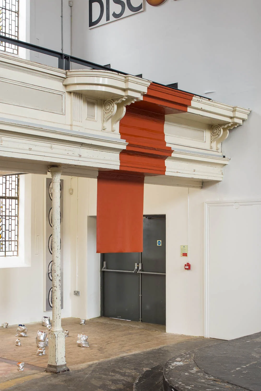 Zachary Susskind Red Flag Act , 2015 Silicone and chapel balustrade Dimensions variable