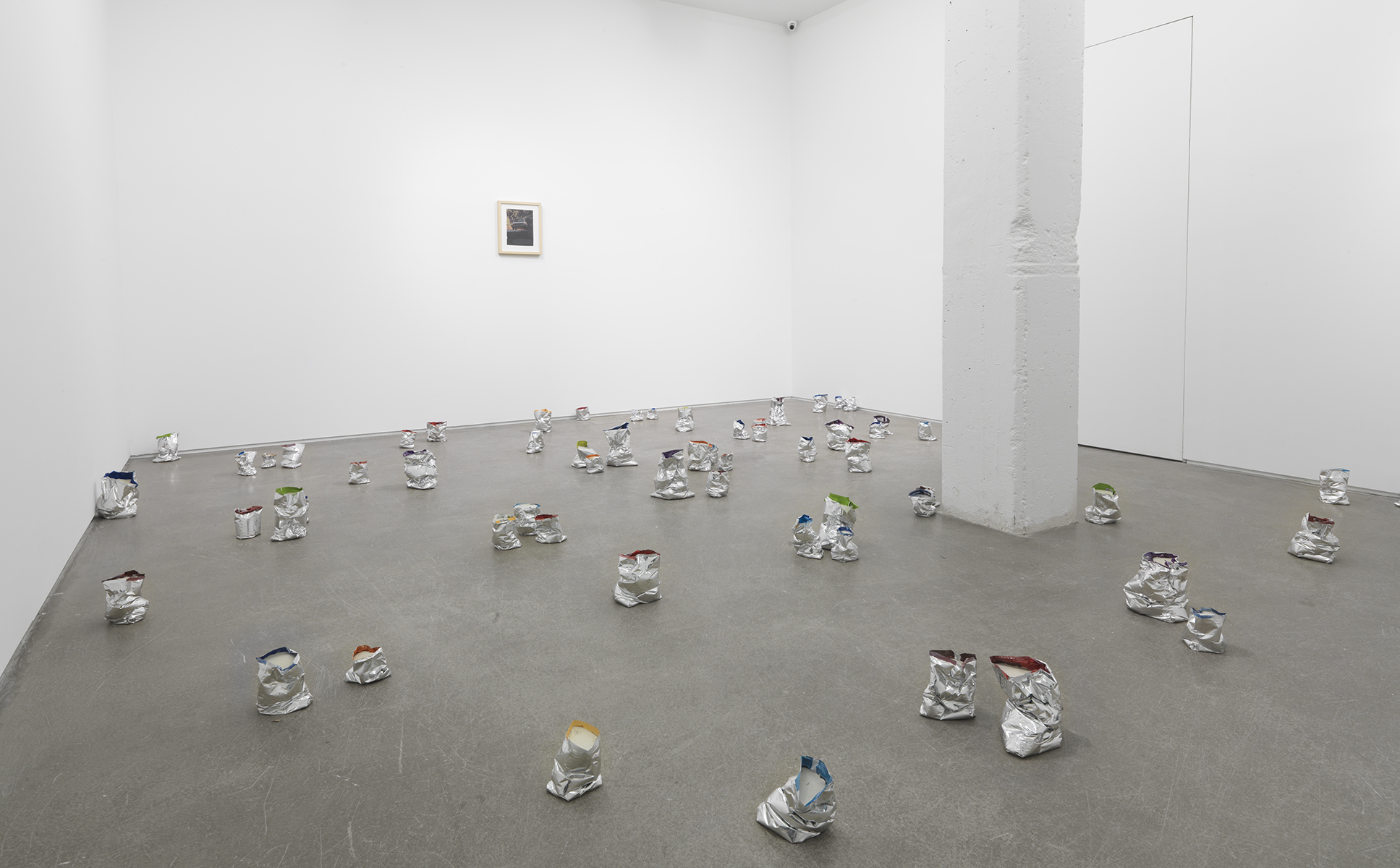 Yankee Two , 2013 Chip bags and concrete Dimensions variable