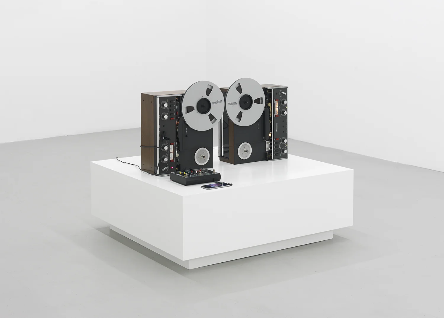 Riley Fripp Riley , 2015 Two Revox A7 MKIII ReelToReel tape recorders, Electro Harmonix 16 second digital delay, and an iPhone on a stage 40 x 42 x 12 inches