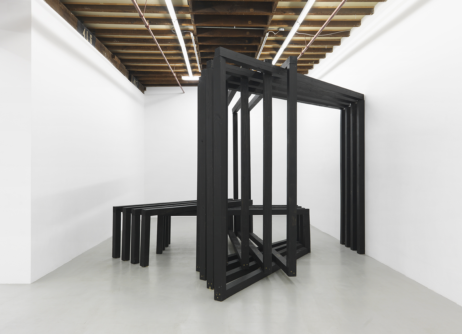 Four Vault, 2015 Pressure treated timber, chalk paint, and fragments used in live event 104 x 164 x 164 inches