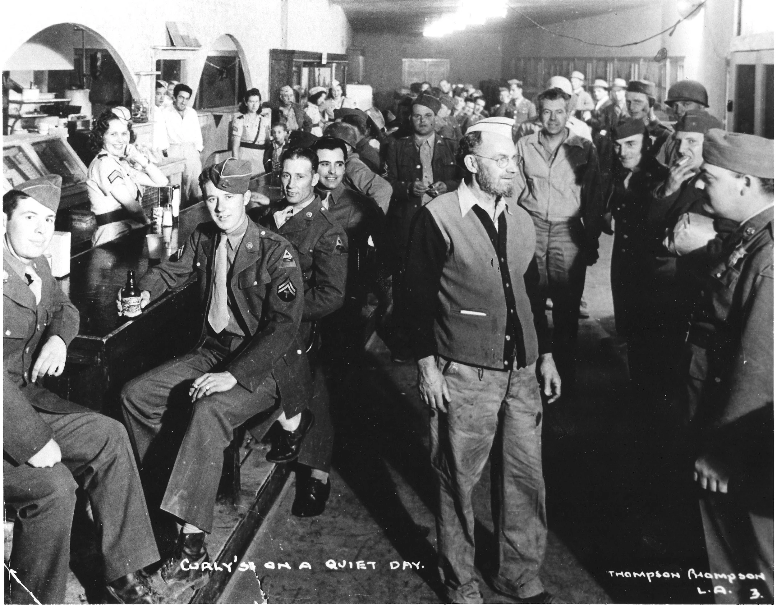 Curley’s Bar in Rice, California full of soldiers from the Desert Training Center. An influx of soldiers drastically impacted local communities; while business increased, price gouging affected troops and locals alike. Thompson photograph, courtesy of the General Patton Memorial Museum. 