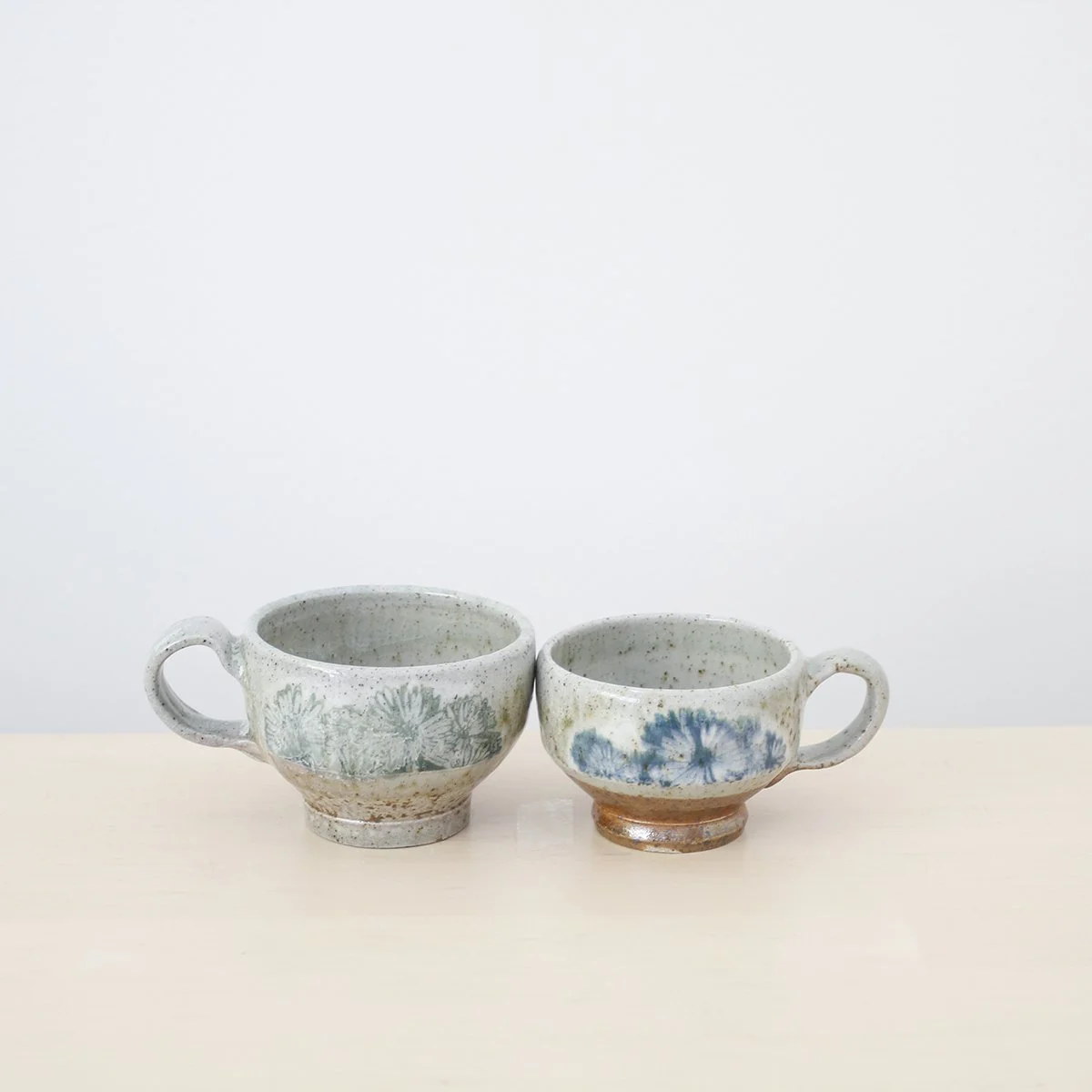 Soda Fired short daisy floral mug