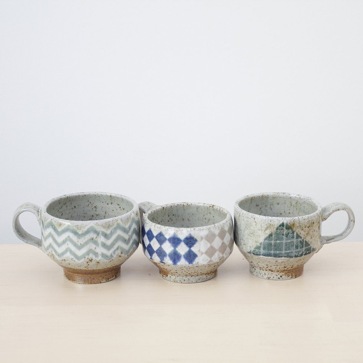 Soda-fired short graphic mug