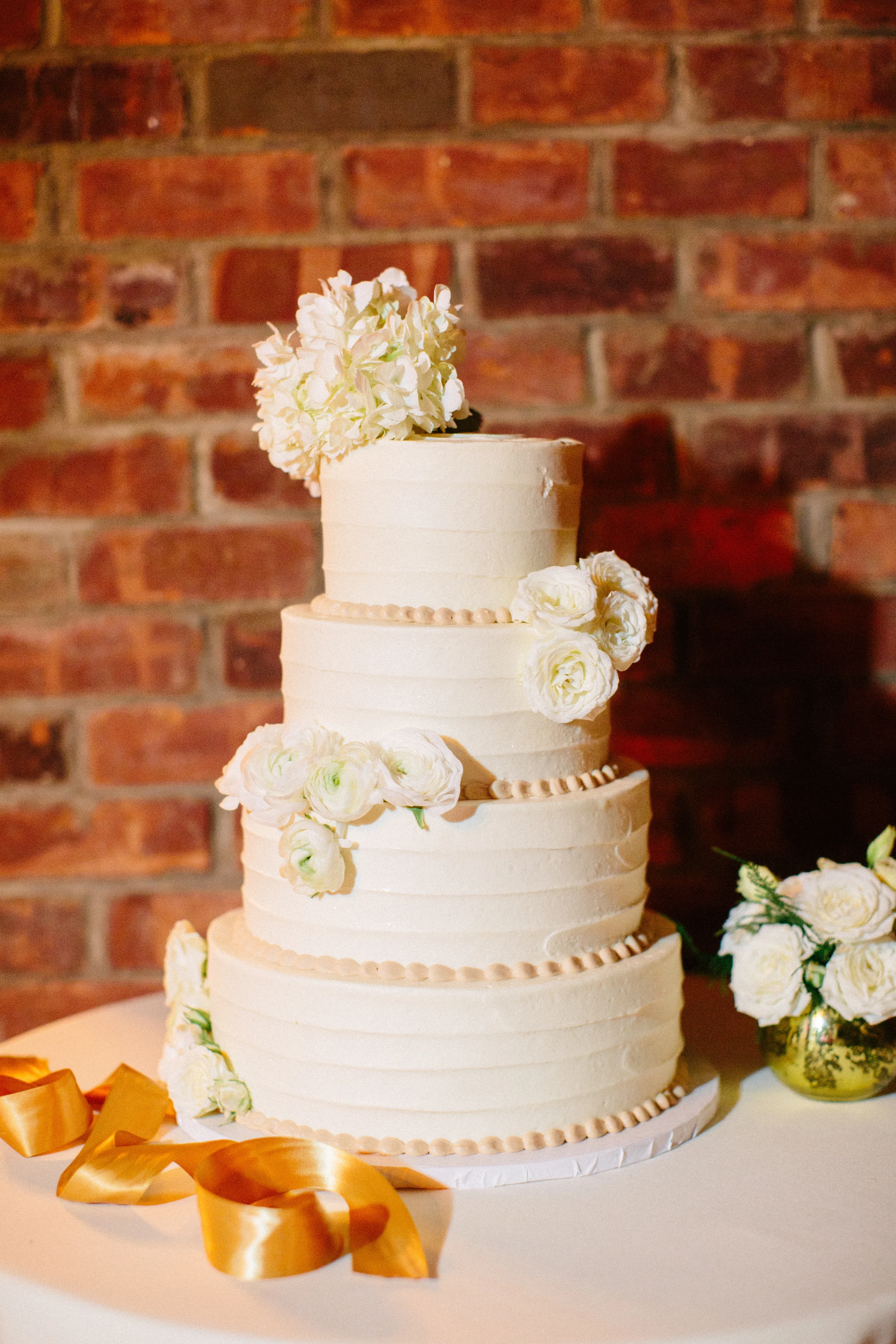 Cake with fresh flowers: Caroline Frost Photography.jpg