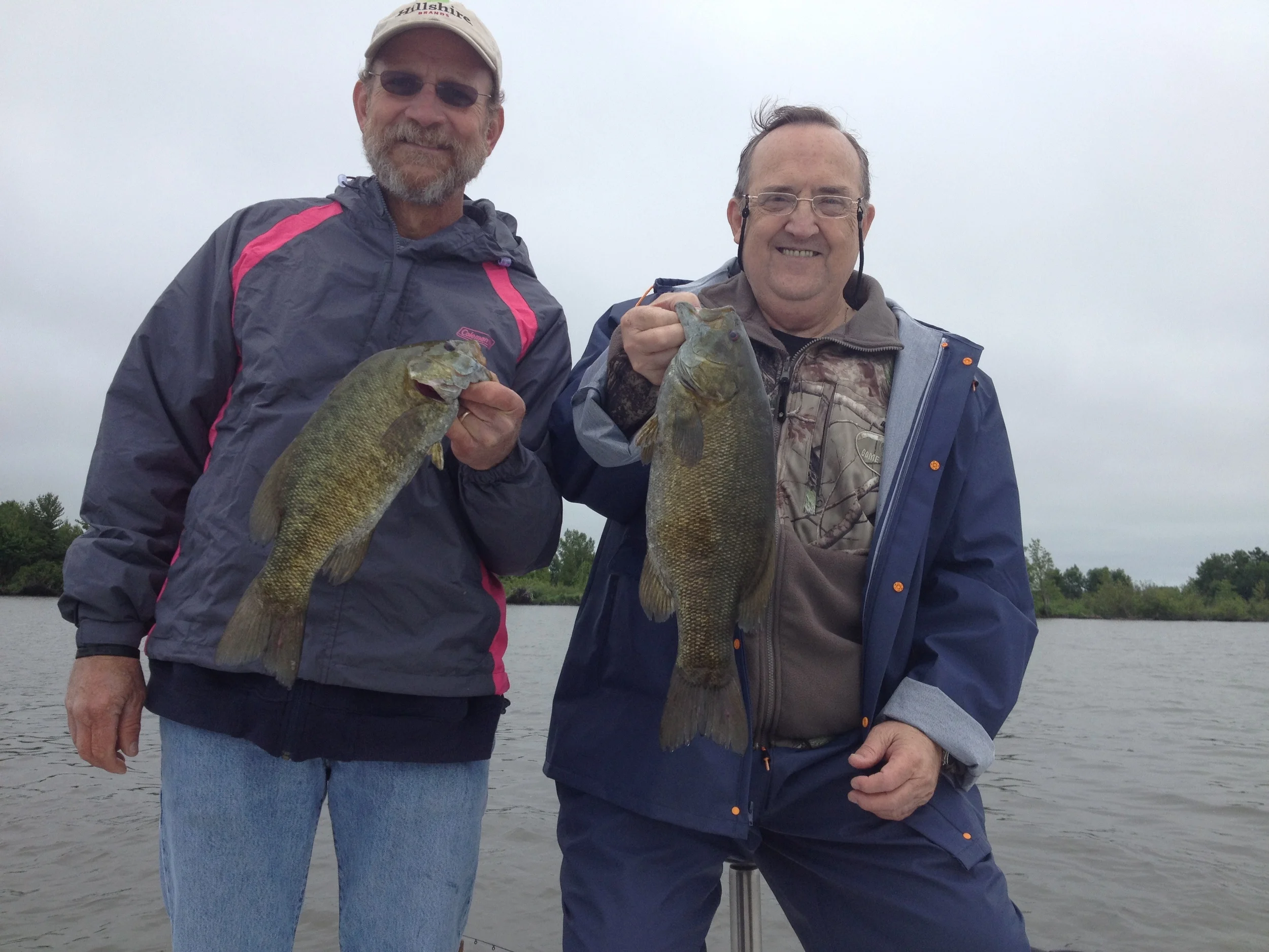 Gary (right) drove his RV all the way from Oklahoma to fish Chequamegon Bay. He has fished Largemouth Bass his entire life, but had never fished for or caught a Smallmouth Bass. He and his brother-in-law Cuck (left) had a great day and I think it's safe to say Gary is hooked on these fish. 