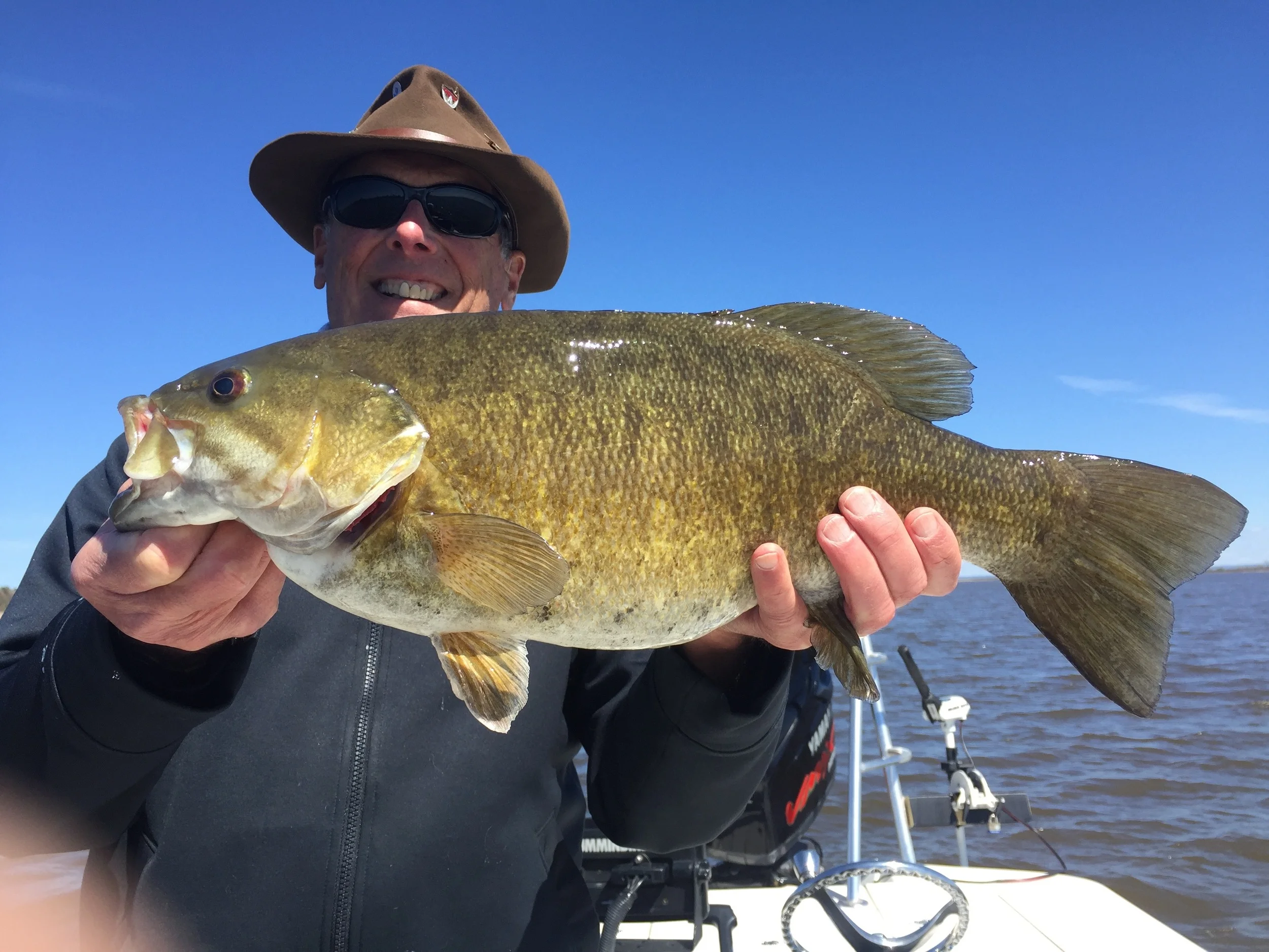 Mike from Appleton with a picture perfect Chequamegon Bay smallmouth on the fly. We were getting fish on topwater by the end of the day yesterday.