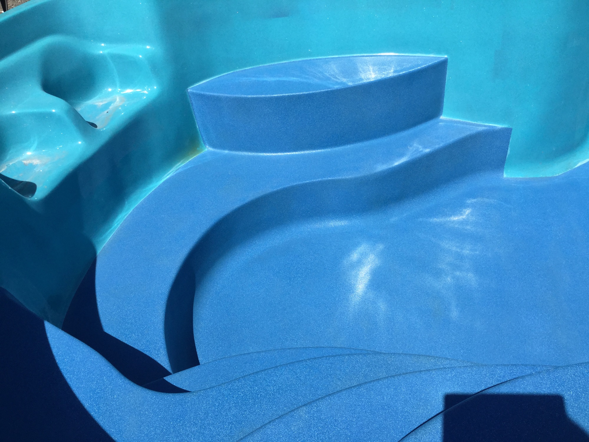 bottom of fiberglass shell was completely deteriorated; after photo showing steps redone too