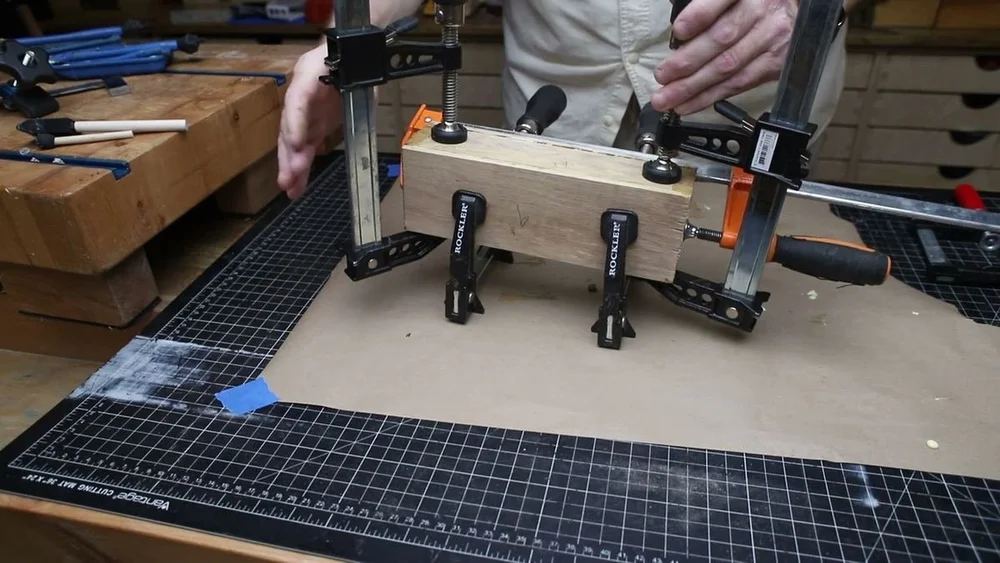 The sealed box under clamps