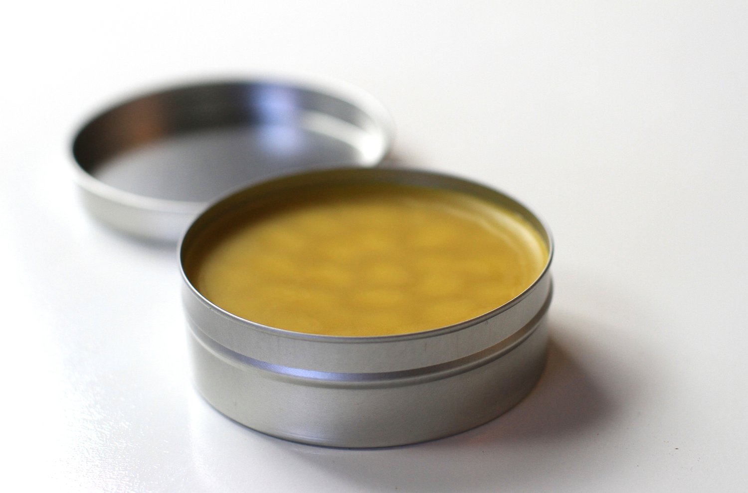 An open tin of Darbin Orvar linseed oil and beeswax polish