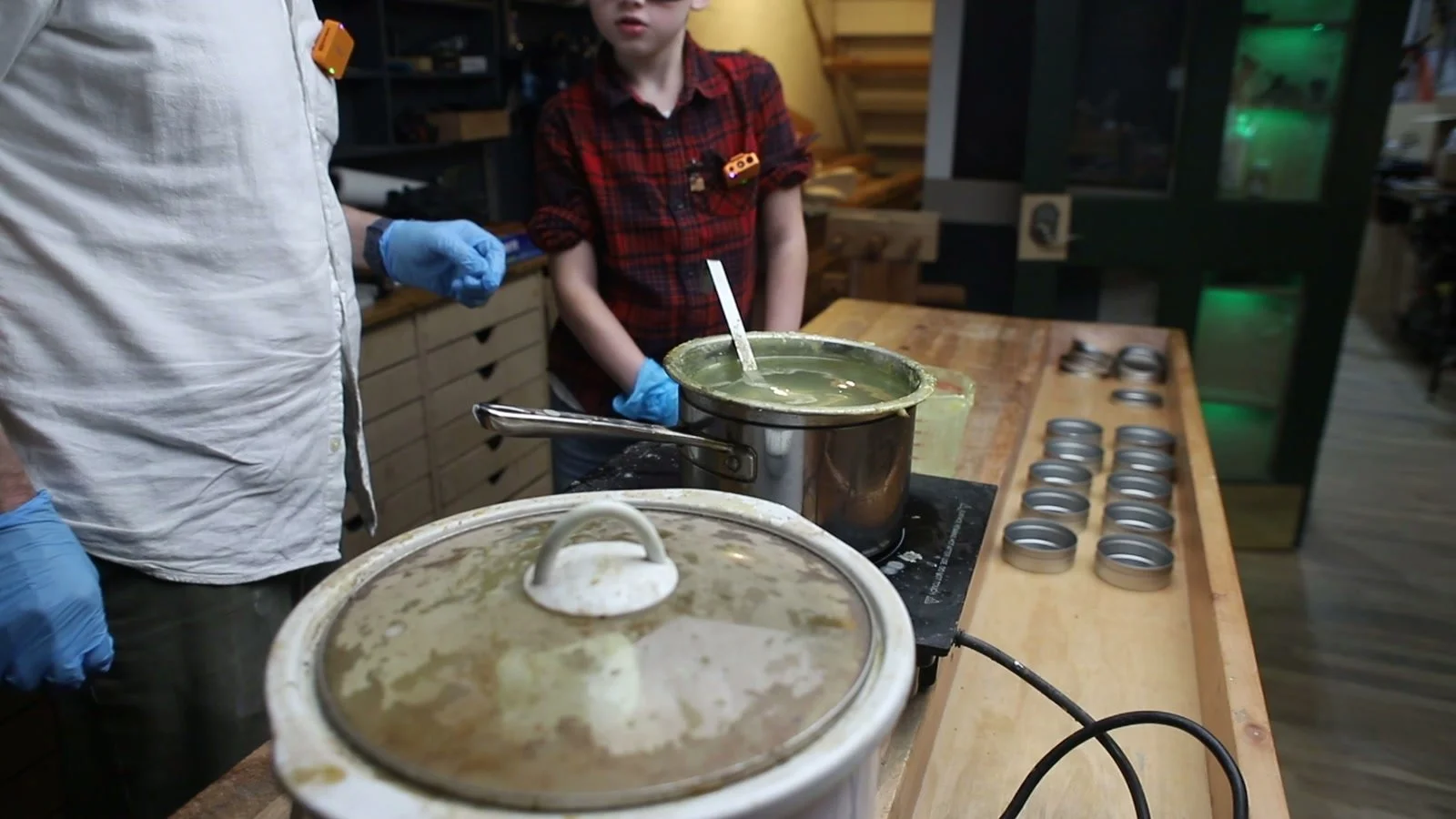 Stirring the beeswax and oil mixture while making wax polish