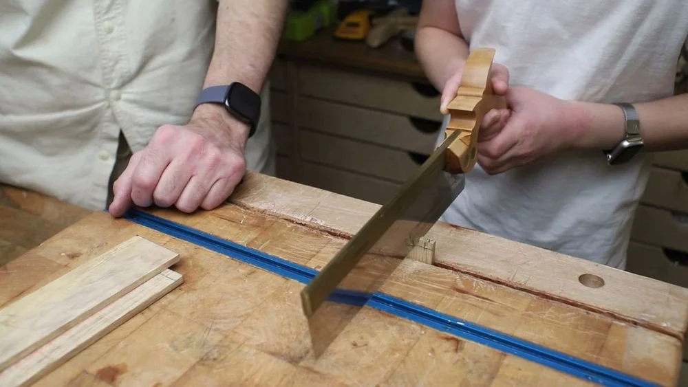 Starting the cut in the knife line with a dovetail saw