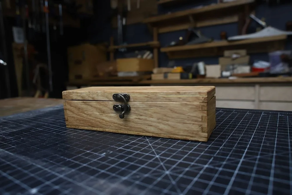 The closed white oak box with its clasp