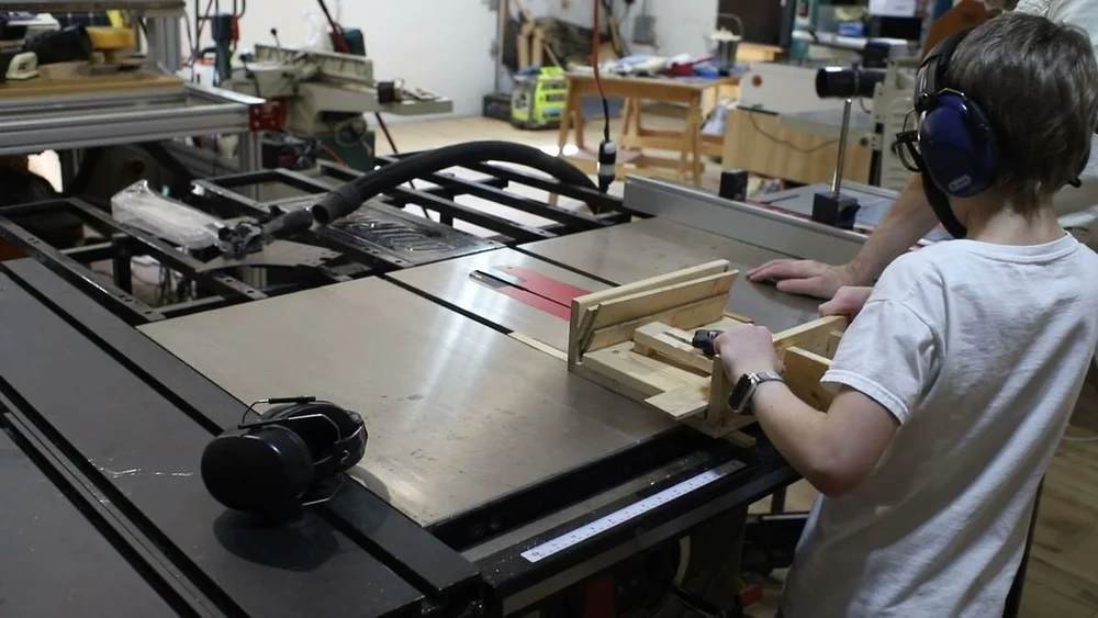 August using the small-parts sled to crosscut the oak sides