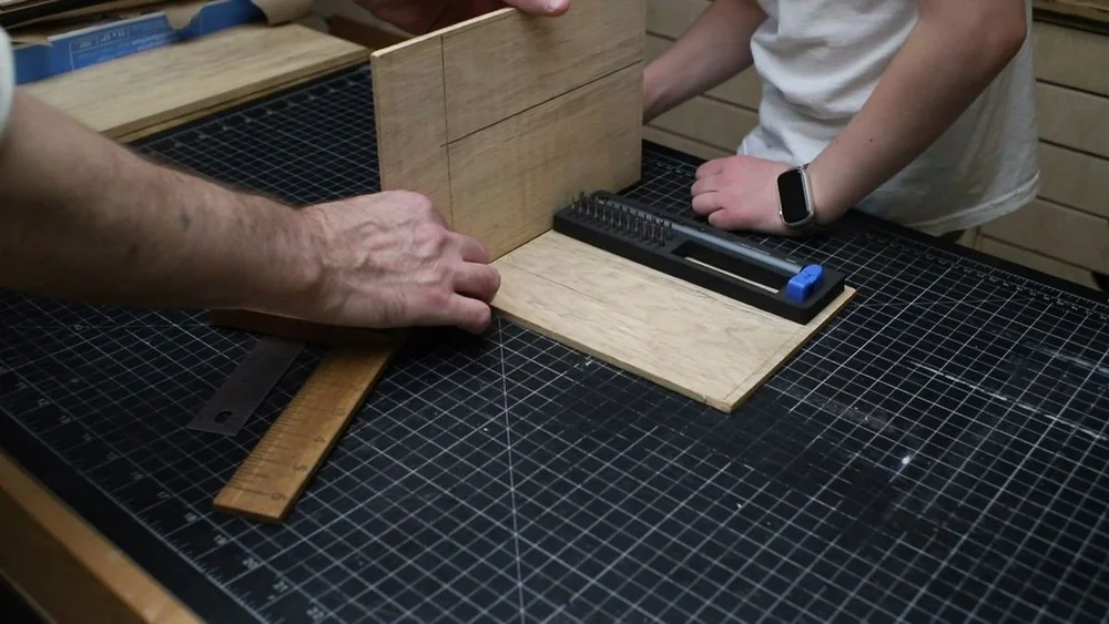 Fitting the foam bit tray onto the oak to mark the inside dimensions