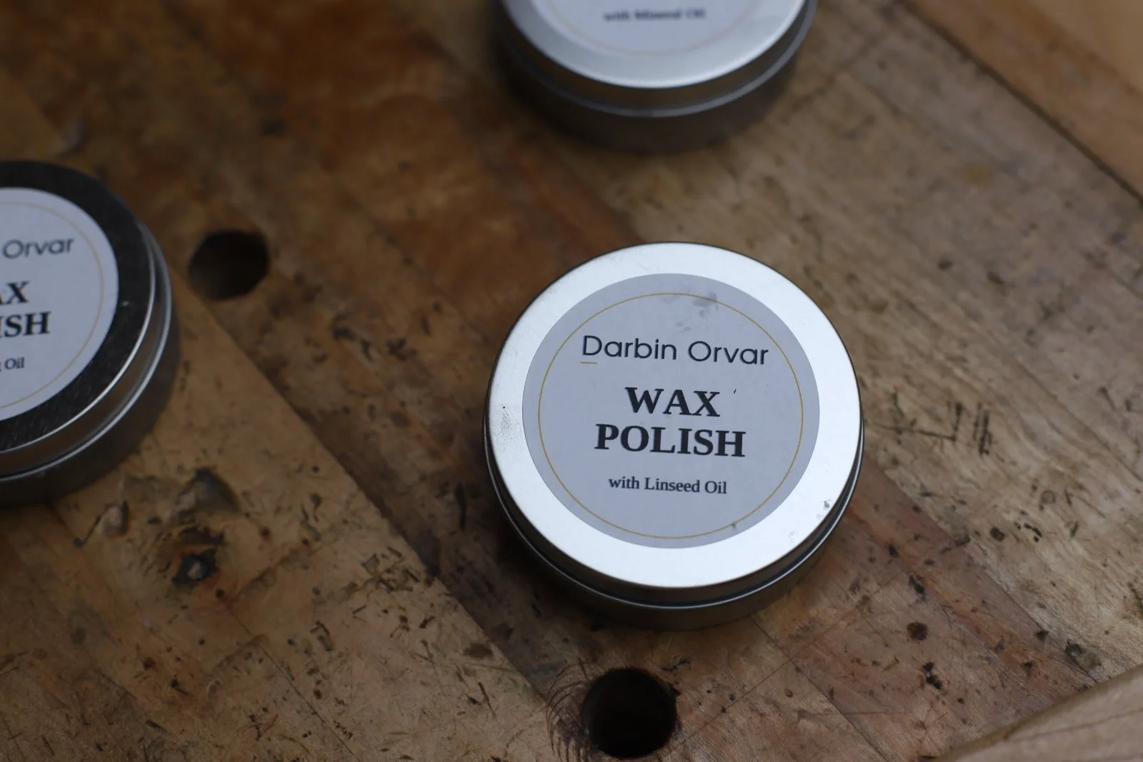 A tin of handmade linseed oil and beeswax polish
