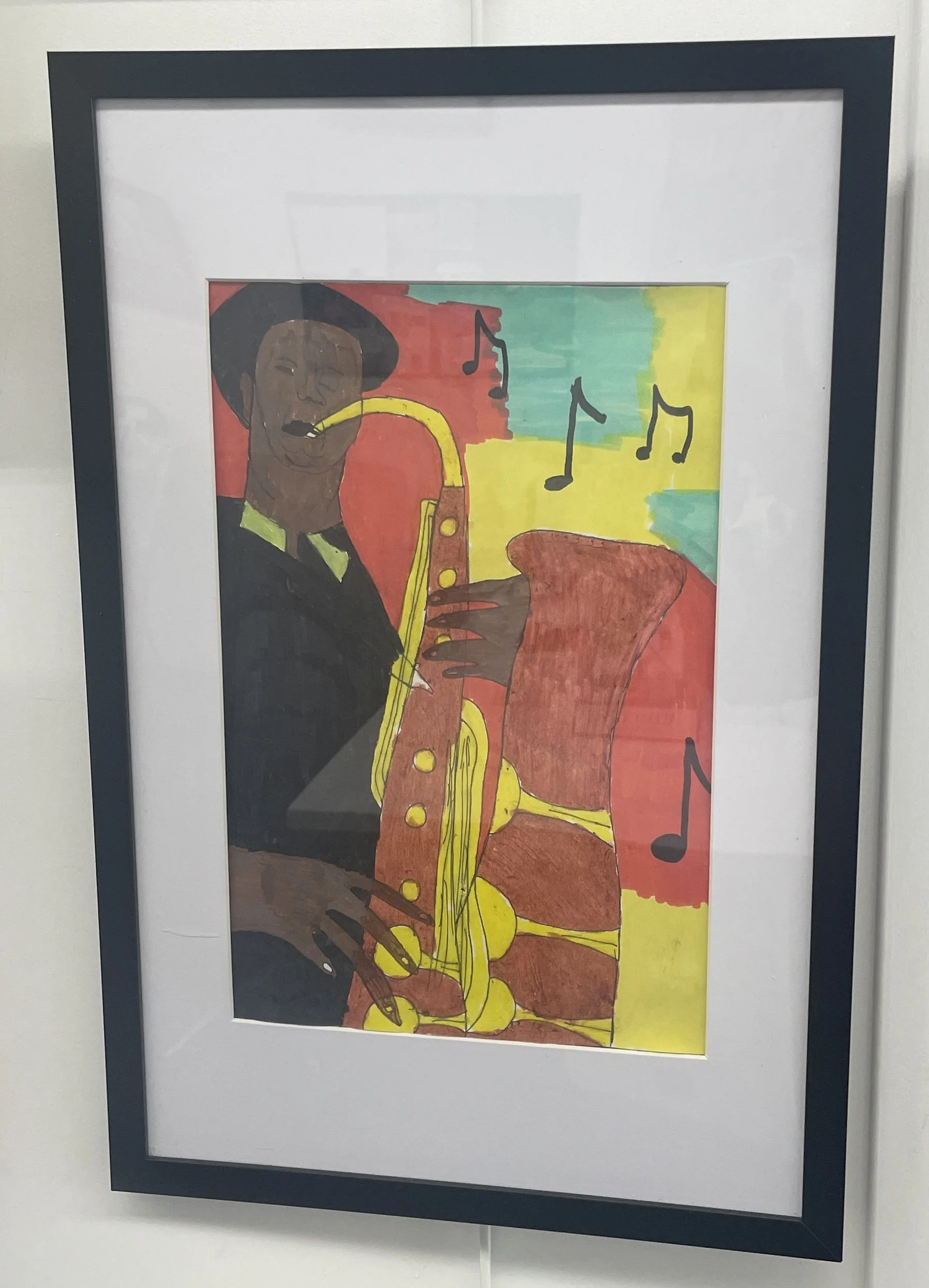 Abstract person playing saxophone