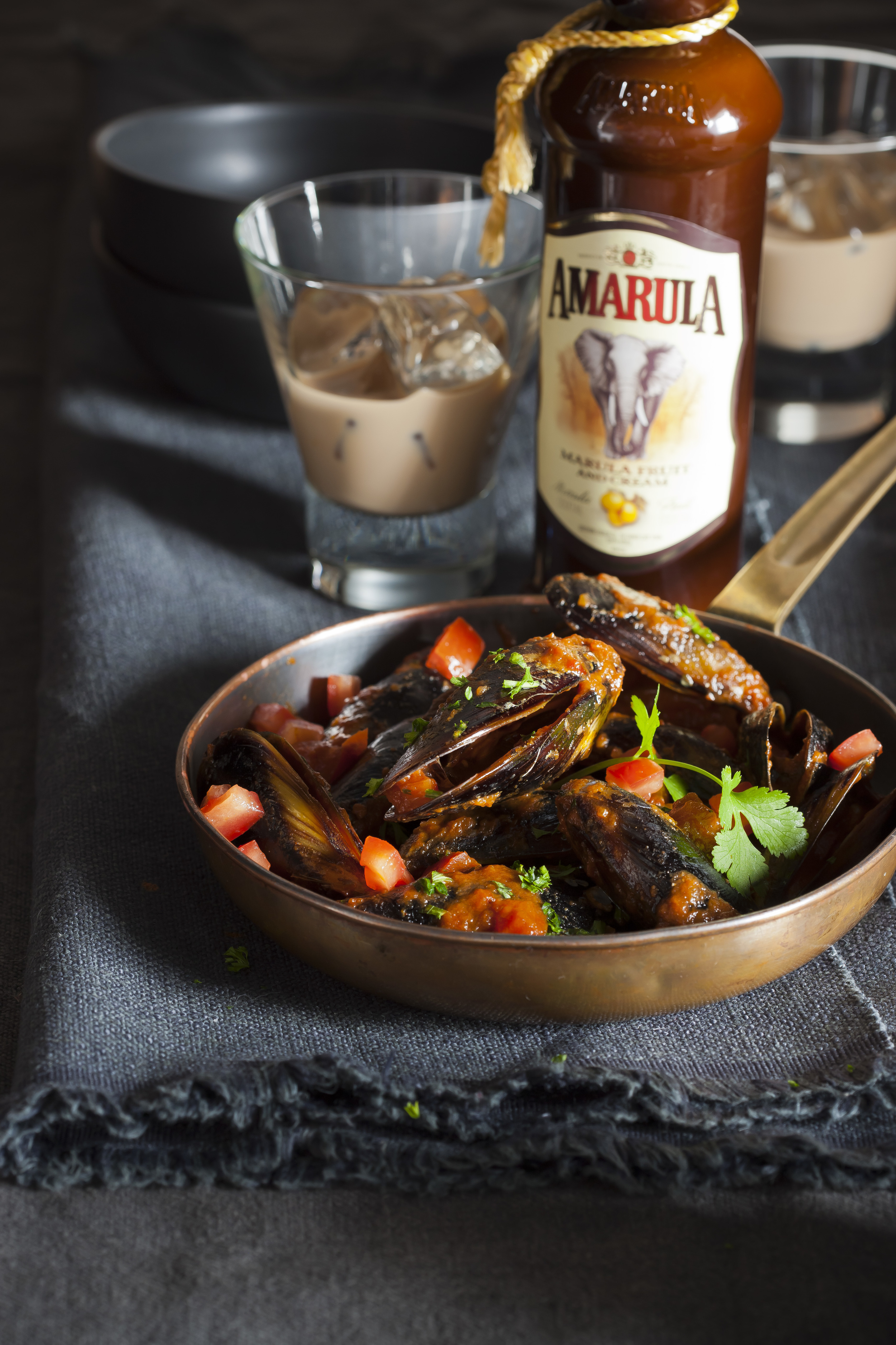 Creole spiced Amarula and mussel chowder with bottle HR.jpg