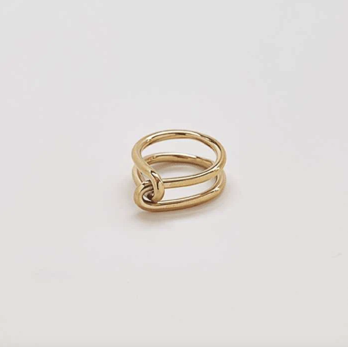 admiral-row-gold-double-knot-ring-1.png
