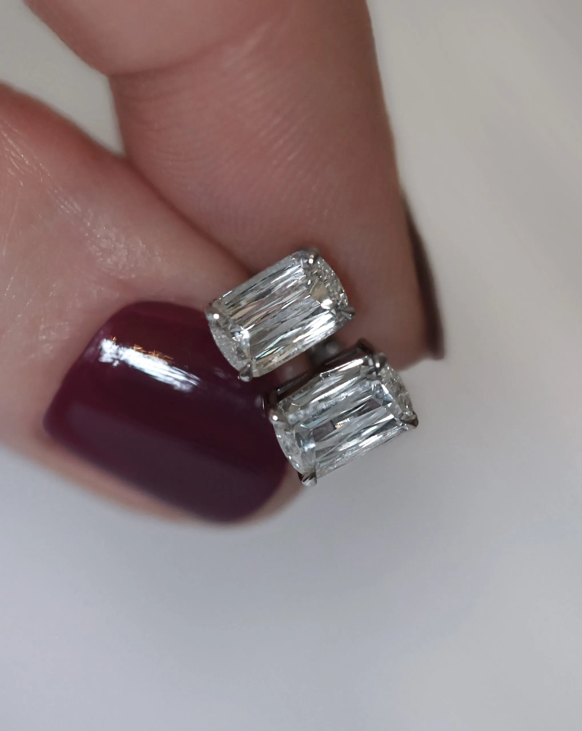 Emerald cut diamond studs made to order by London jeweler Lena Cohen
