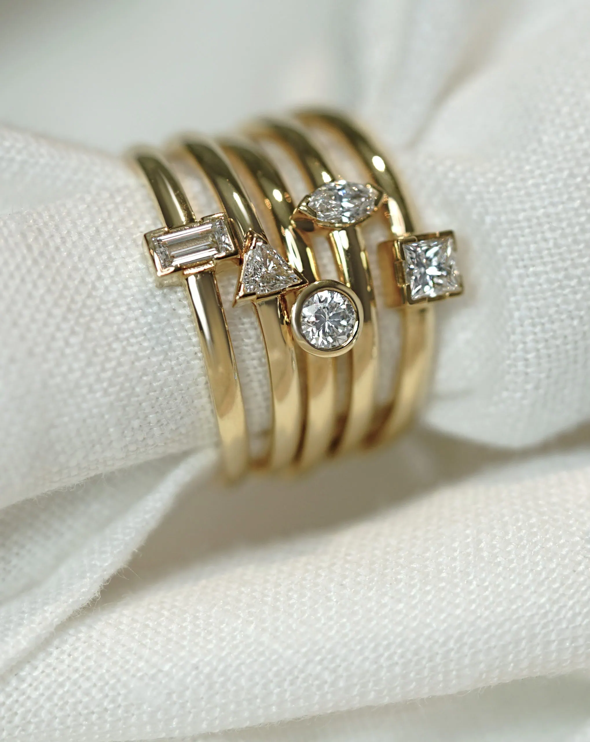 Diamond ring stack in 18ct yellow gold handcrafted in London by Lena Cohen Jewelry