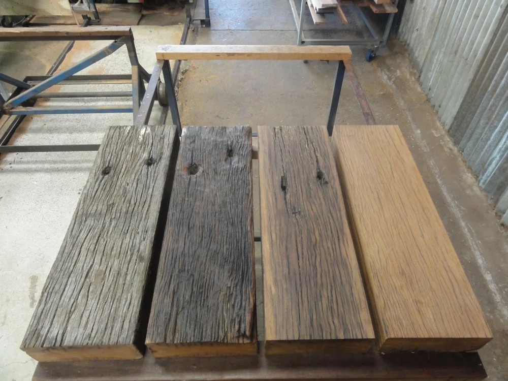 Tallowwood and Blackbutt wharf decking boards at four different levels of processing