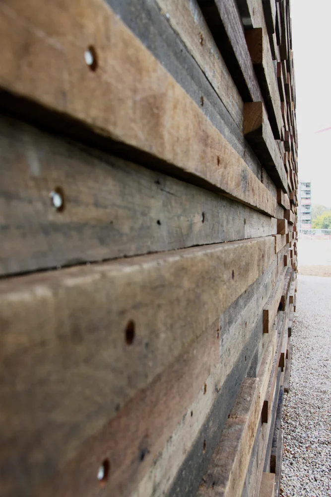 Recycled timber cladding supplied in a mix of sizes and species, salvaged from house roof timbers and square edge flooring from the Q Stores demolition in Alexandria.
