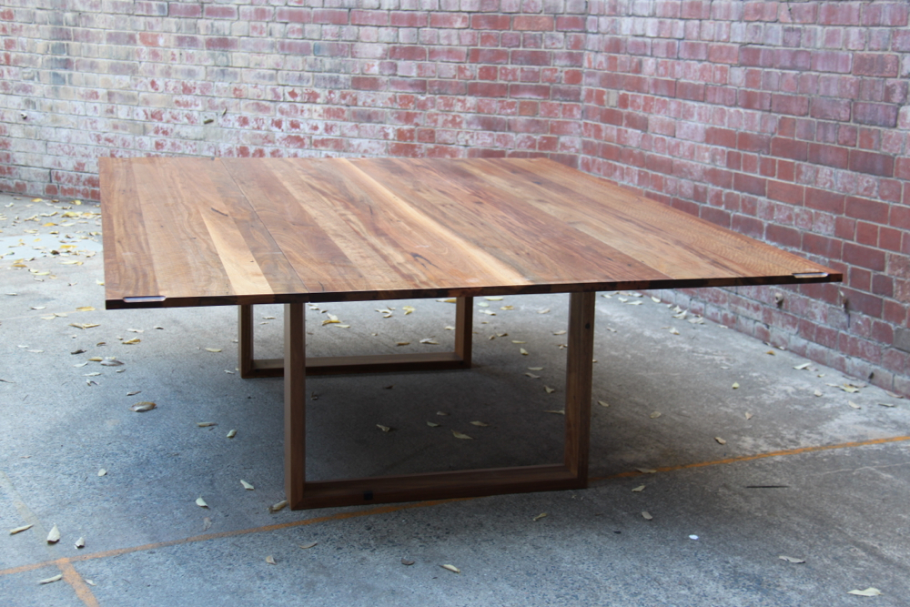 Folding leaf table custom built for Amelia Witheridge fully expanded, seating for 14 people.