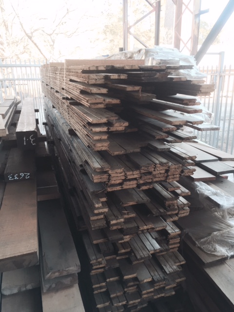 Boards from RAAF Richmond salvaged, cleaned with the nails removed at Thor's Hammer, Old Canberra Brickworks.