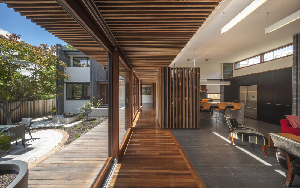 Spotted Gum salvaged from the Bicentenial Baskeball Stadium in Penrith was used in a variety of creative ways on this house build. The ceiling cladding, floor boards and matching decking cleverly join the outdoor and indoor living space.