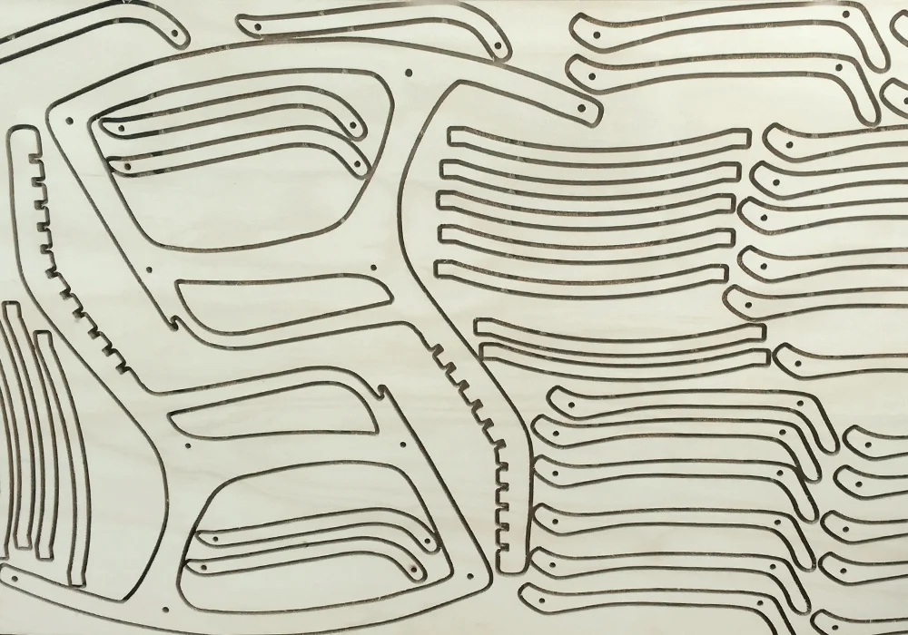 A rocking chair in the making by David. Laser cut from beech ply.