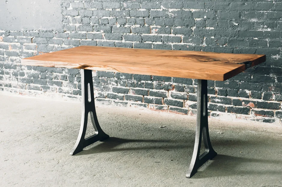 Small slab table with cast iron legs