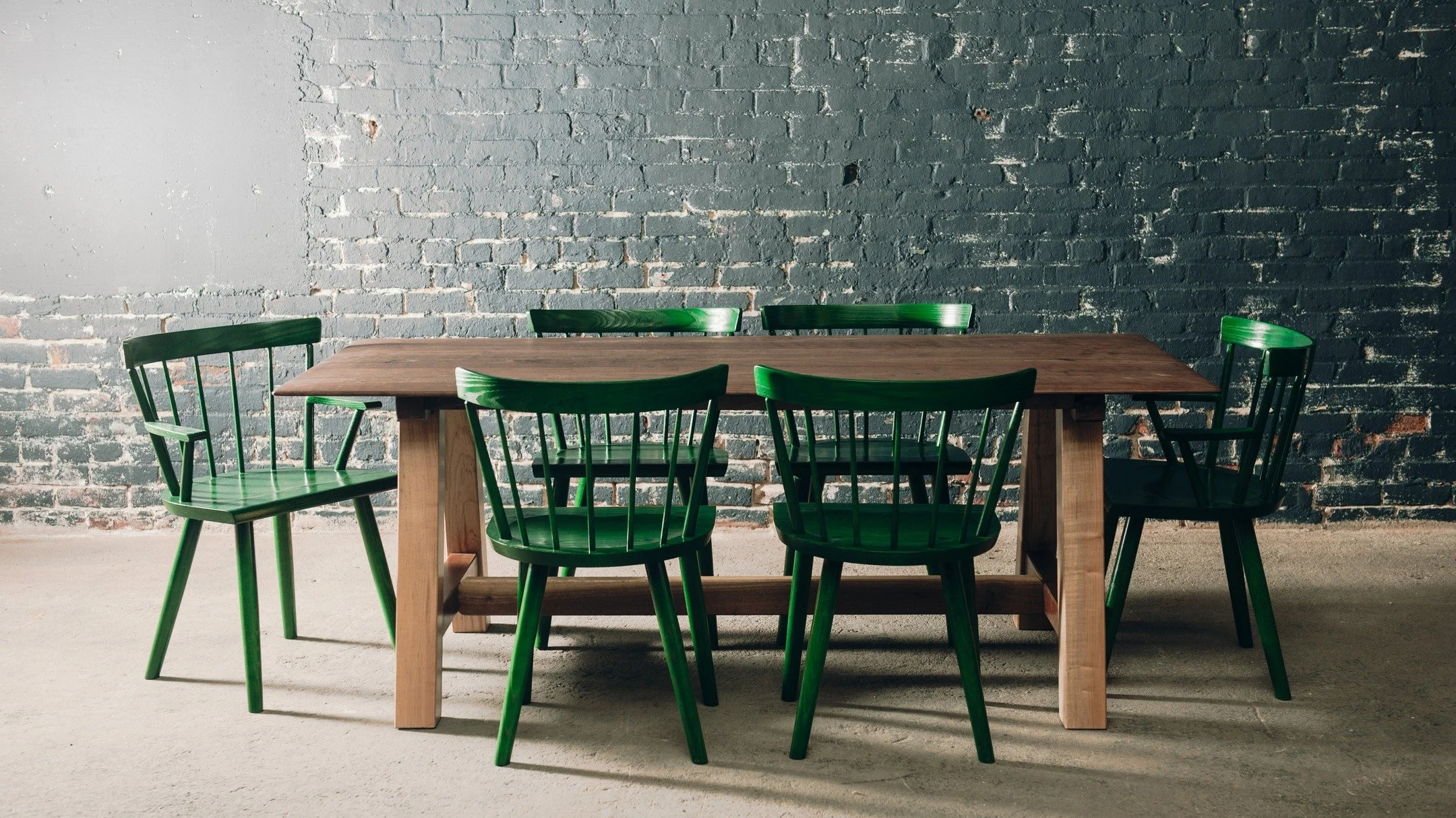 Spring is in the air 🌱 

Simple pop of color with the green colts from @oandgstudio 

My take on the simple harvest trestle table with Maple and Walnut. 

#home #furniture #diningtable #chairs #interiors