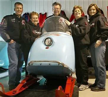 The Harrison family attends several vintage snowmobile rallies each year, clad in their black and red Scorpion gear. From left to right: Randy Harrison, Eileen Harrison, Dick Harrison, Deb Piirainen and Starr Harrison. (Harrison family - Joel Koyama, Star Tribune)