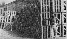 GLEN GUTZMAN STANDS BY LARGE ORDER OF SCORPIONS, CRATED AND READY FOR SHIPMENT TO AN EASTERN DEALER.