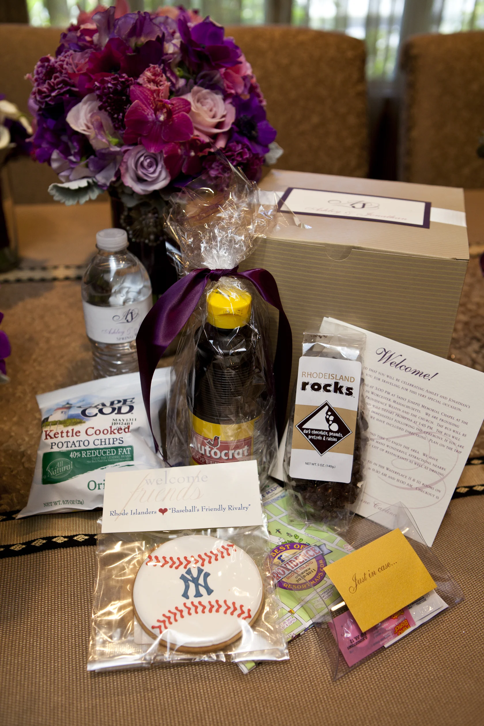 This bride had Welcome Boxes for her Providence, Rhode Island wedding. It included many Rhode Island goodies including Autocrat Coffee Syrup!