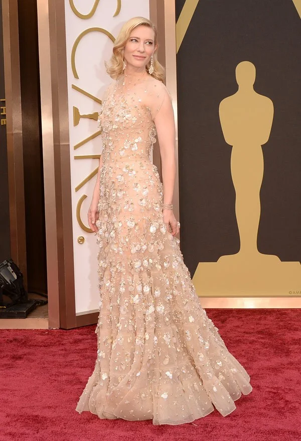 Cate Blanchett was an absolute knockout wearing a Champagne Armani Prive tulle gown embellished with Swarovski crystal baguettes. She accessorized it with exquisite Chopard jewellery and Roger Vivier shoes.