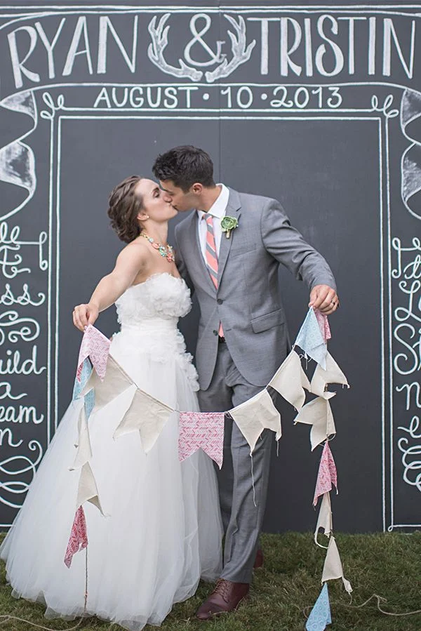 This is the cutest photo backdrop for a wedding!