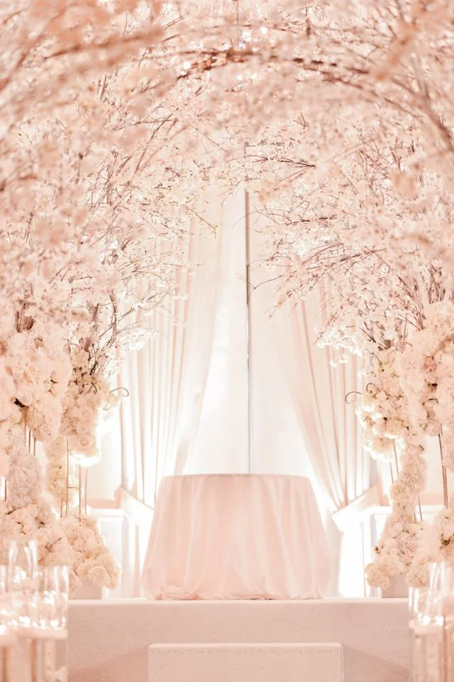 What a vision in spring and pink for a ceremony!